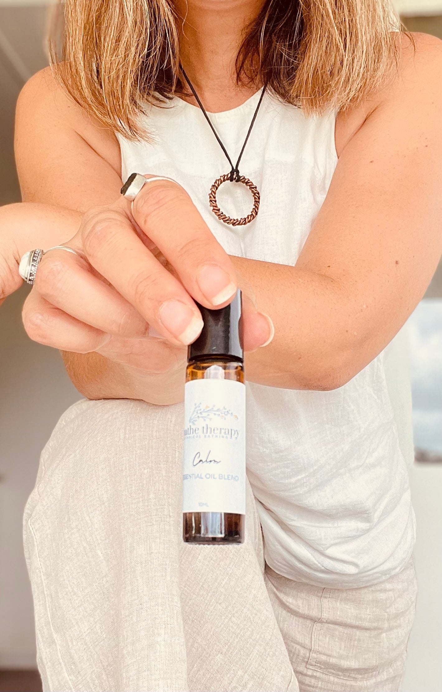 Calm essential oil roller with citrus lavender patchouli frankincense amethyst