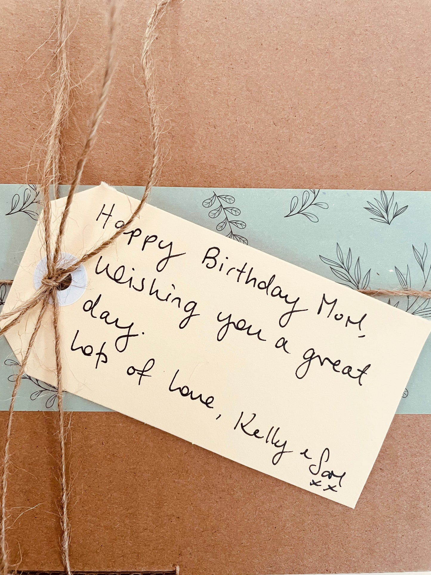 Handwritten personalised note on gift box